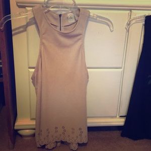 Pinkish tan suede high neck tank top.